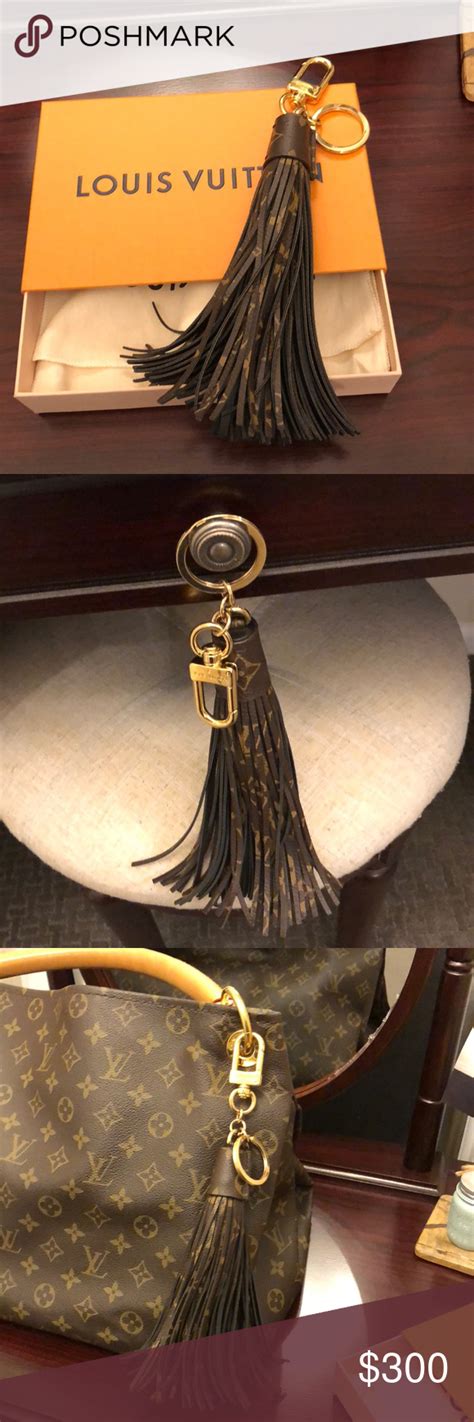 louis vuitton tassel charm|Louis Vuitton key holder.